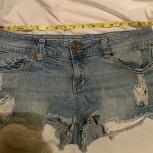 Almost famous shorts with lace pocket detailing.